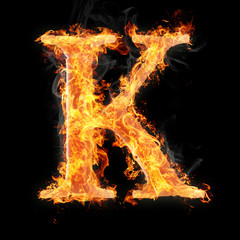 Fonts and symbols in fire on black - K