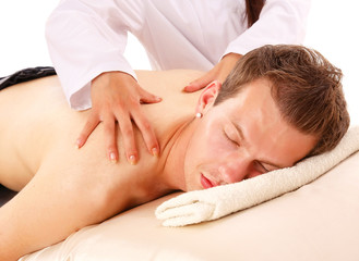 Fototapeta na wymiar Young smart male enjoying massage