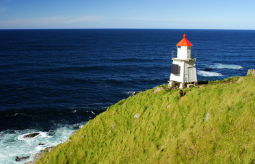 Fototapeta na wymiar lighthouse on the coast of Lofoten, Norway