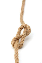 A brown rope with a knot isolated on white background