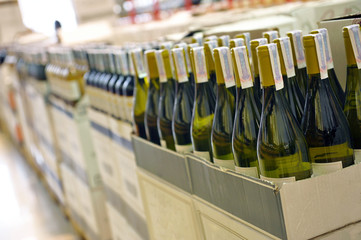 wine in bottles in wine shop