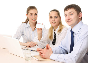 Fototapeta premium At the meeting, focus on the woman holding an empty card