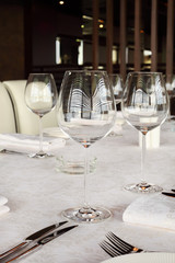 beautiful serving at table with white tablecloth in restaurant;