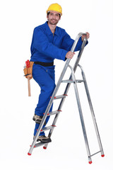 Manual worker climbing ladder