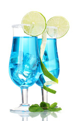 Blue cocktail in glasses with ice and sugar isolated on white