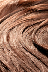 Beautiful shiny red hair texture, closeup shot