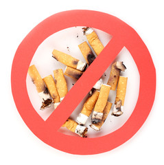 Cigarette butts with prohibition sign isolateed on white