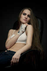 Naklejka premium Long haired beauty with the fists