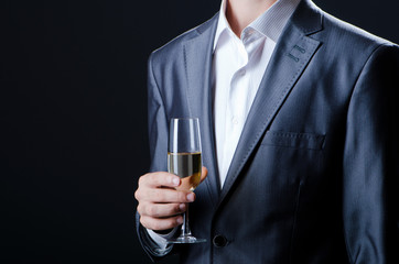 Man tasting wine in glass
