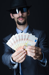 Man with counterfeir money