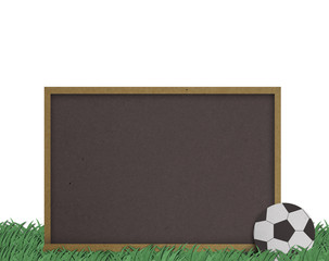 blank blackboard and classic football on grass. made by grunge r