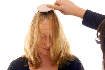Fototapeta premium Portrait of a young woman at the hairdresser