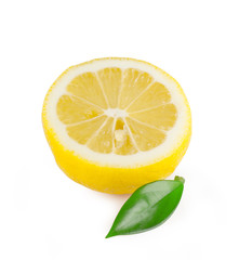 Half a ripe lemon with leaf