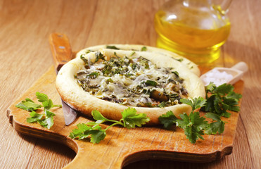 fresh pizza with spinach