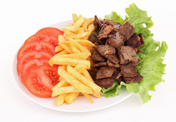 beef, french fries and vegetable