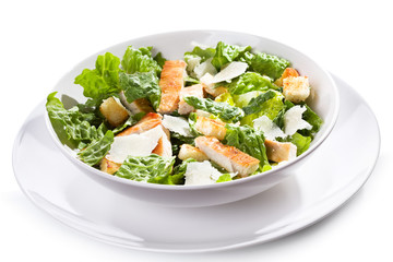 Caesar salad with chicken and greens