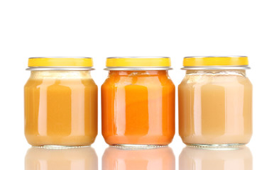 Jars of baby puree isolated on white