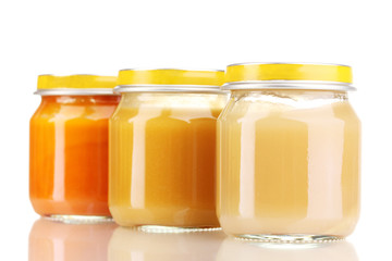 Jars of baby puree isolated on white
