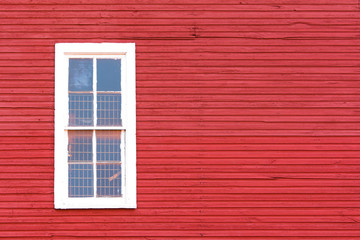 White Window on Red Siding