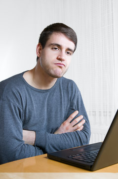 man pull a face