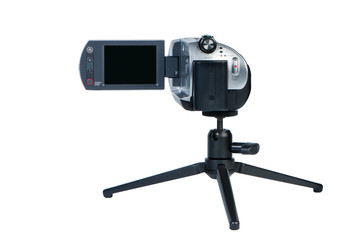 Portable camcorder with LSD display on mini-tripod.