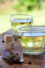 Green tea infuser with sugar cubes