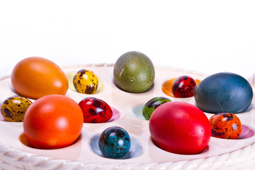 Colorful Easter egg tray isolated on white