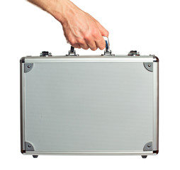 Silver metal briefcase in hand