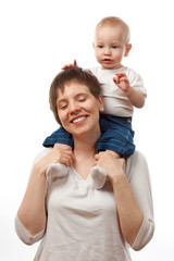 Child sitting on his mother's shoulders