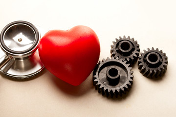 Mechanical ratchets, stethoscope and red heart