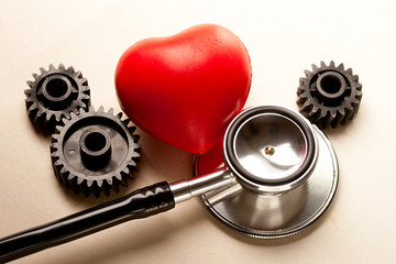 Mechanical ratchets, stethoscope and red heart