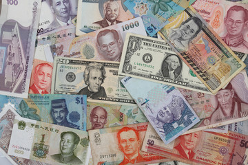 pattern of  asian and dollar  bank notes background