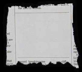 Newspaper clipping torn paper on black background
