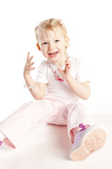 sitting little girl wearing necklace