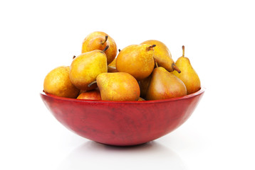 Red bowl with fresh pears