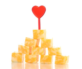 Cheese pyramid isolated on white