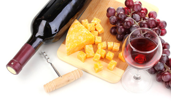 Bottle Of Great Wine With Wineglass And Cheese Isolated On White