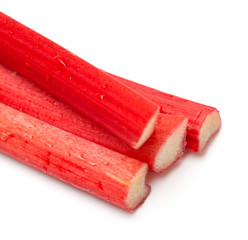 freshly cut stems of rhubarb on a white background