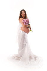 The image of a pregnant woman with violet flowers isolated on wh