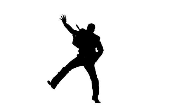Black silhouette in slow motion standing upright