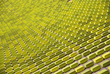 pattern of green seats in a sport stadium
