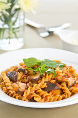 Fusili with mushroom in tomato sauce