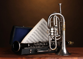 antique trumpet and clarinet in case