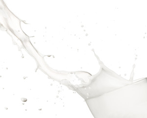 Pouring milk into glass, isolated on white background