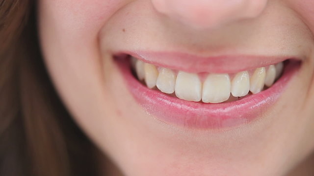 Happy brunette woman smiling