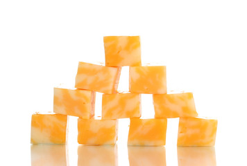 Cheese pyramid isolated on white