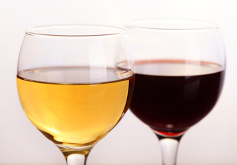 Two glasses of wine, red wine and white wine