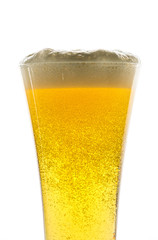 Glass of light beer on white background