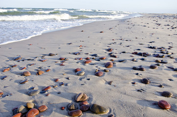 background of seashore little stones reflection