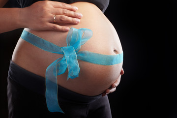Pregnancy and blue ribbon